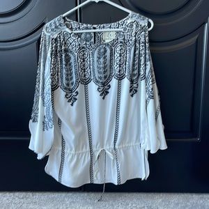 Beautiful “bare shoulder” black and white blouse by i(E.